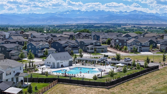55 Morgan Cir, Erie, CO 80516 - aerial view of residential area with a pool and mountains