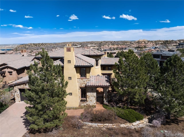 8002 Galileo Way, Littleton, CO 80125 - view of building exterior featuring a residential view and driveway