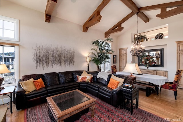 8002 Galileo Way, Littleton, CO 80125 - living area featuring light wood-style floors, beam ceiling, a notable chandelier, and high vaulted ceiling