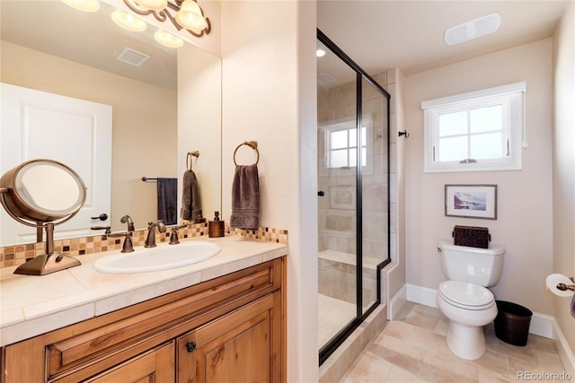 8002 Galileo Way, Littleton, CO 80125 - bathroom featuring vanity, visible vents, a shower stall, and toilet