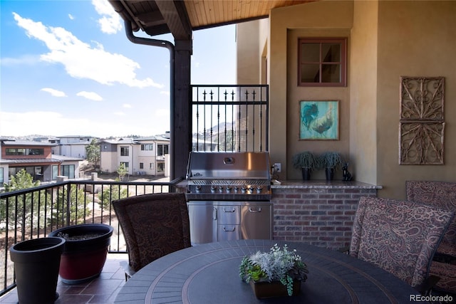 8002 Galileo Way, Littleton, CO 80125 - balcony featuring a grill and outdoor dining space