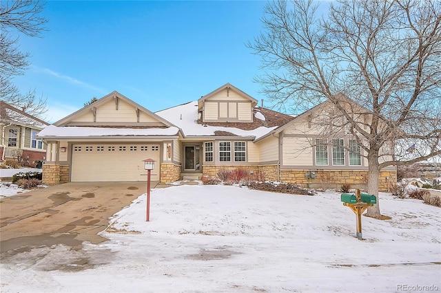 view of front of property with a garage