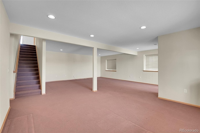 basement featuring carpet flooring