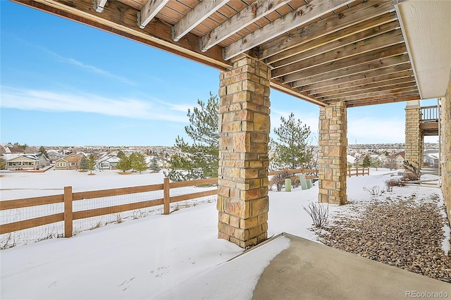 view of snow covered patio