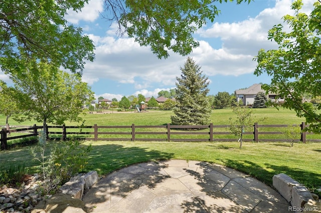 view of yard with a patio and a rural view