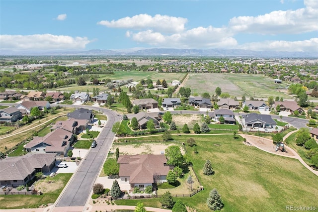 aerial perspective of suburban area with mountains