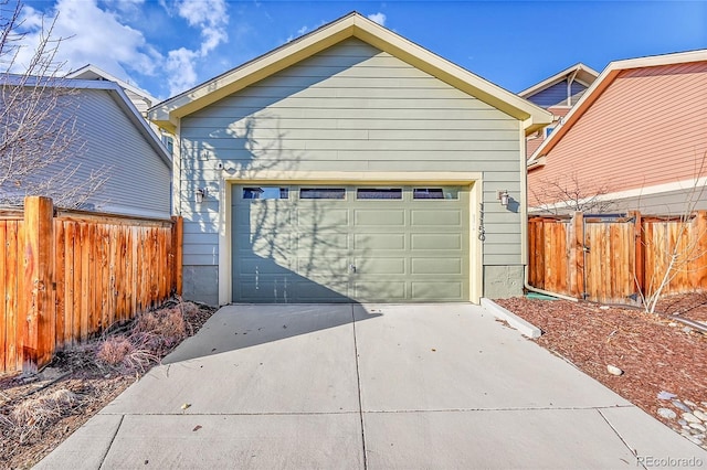 garage featuring fence