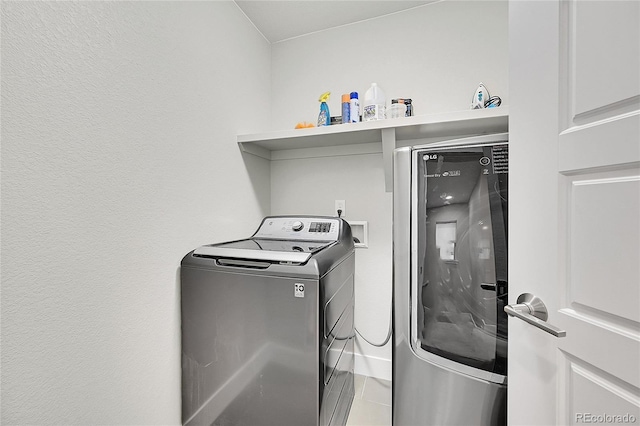 laundry room featuring laundry area and washer and dryer