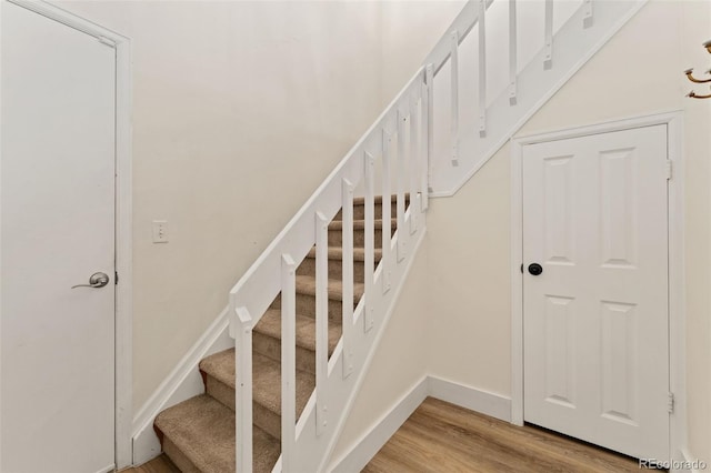 12573 E Pacific Cir Unit C, Aurora, CO 80014 - stairs with wood finished floors and baseboards