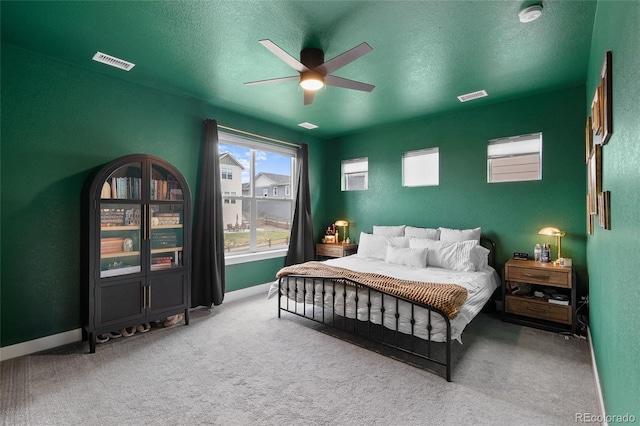 199 Simmental Loop, Castle Rock, CO 80104 - carpeted bedroom featuring baseboards, a ceiling fan, and a textured ceiling