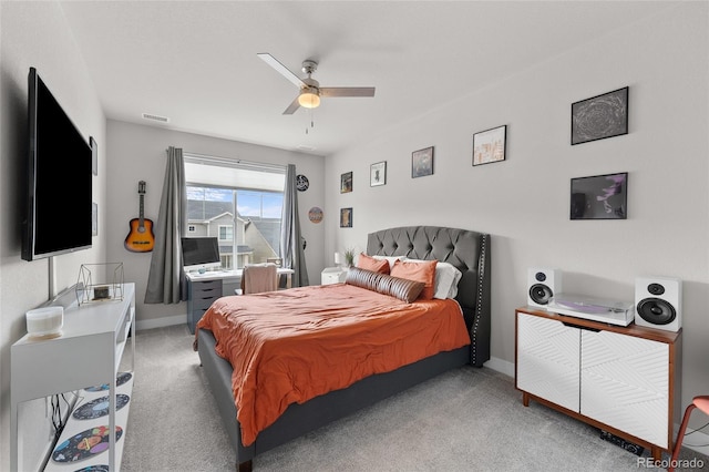 199 Simmental Loop, Castle Rock, CO 80104 - carpeted bedroom with baseboards and a ceiling fan