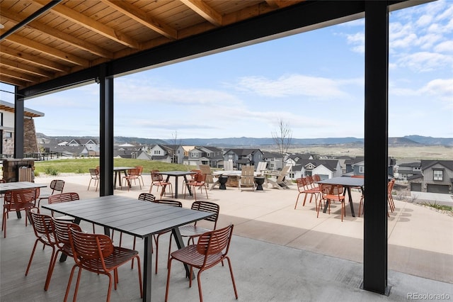 199 Simmental Loop, Castle Rock, CO 80104 - view of patio featuring outdoor dining space, a residential view, and a mountain view