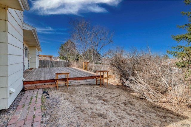 view of yard featuring a wooden deck