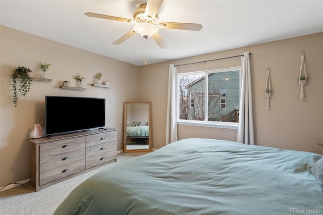 bedroom with carpet flooring and a ceiling fan