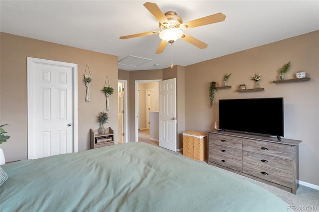 carpeted bedroom with baseboards and ceiling fan