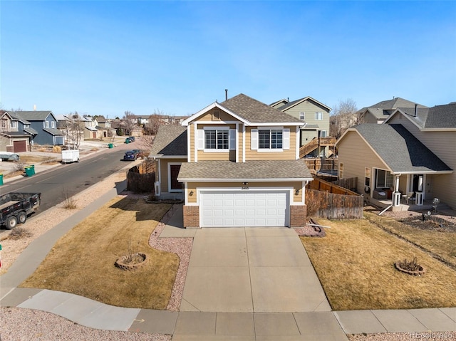 view of front facade with driveway, an attached garage, a residential view, a shingled roof, and brick siding