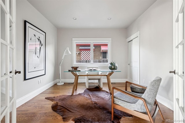 office with baseboards, wood finished floors, and recessed lighting