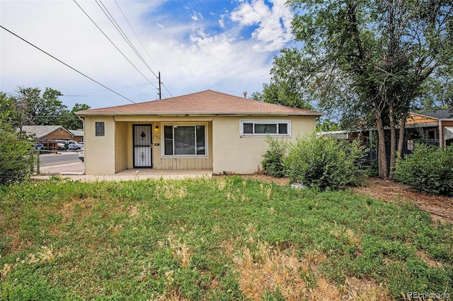 1303 Havana St, Aurora, CO 80010 - back of house with stucco siding