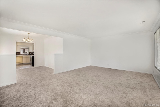 1303 Havana St, Aurora, CO 80010 - unfurnished room with ornamental molding, a chandelier, and light carpet