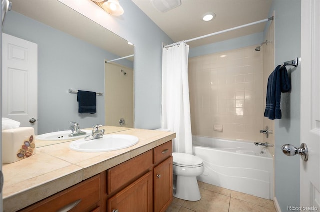 767 Roslyn St Unit 20, Denver, CO 80230 - full bath featuring tile patterned flooring, shower / bath combo with shower curtain, visible vents, vanity, and toilet