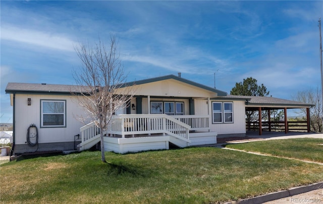 112 8th St, Hugo, CO 80821 - view of front of house with covered porch and a front yard