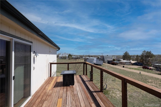 112 8th St, Hugo, CO 80821 - deck with grilling area and a lawn