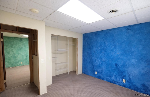 112 8th St, Hugo, CO 80821 - unfurnished bedroom with carpet, a drop ceiling, and a closet