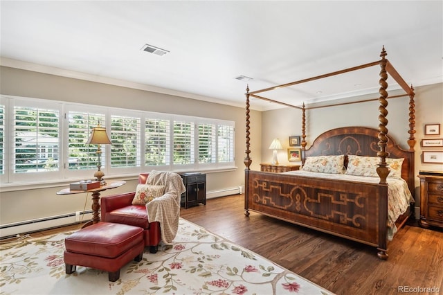 bedroom with ornamental molding, a baseboard radiator, wood finished floors, and visible vents