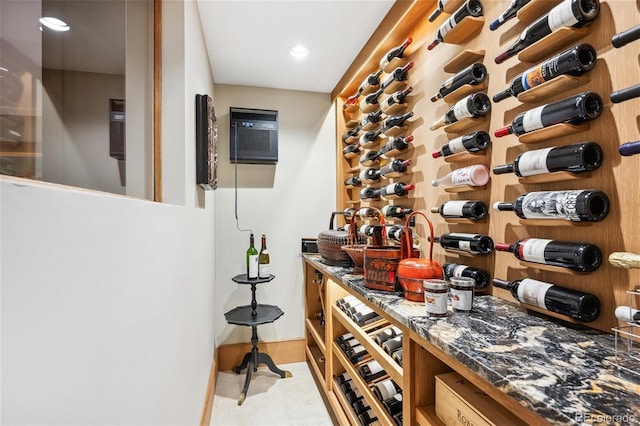 wine cellar featuring a wall unit AC