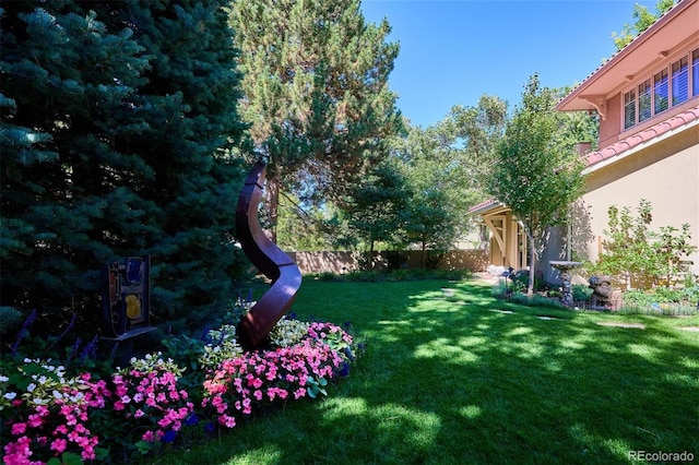 view of yard featuring fence