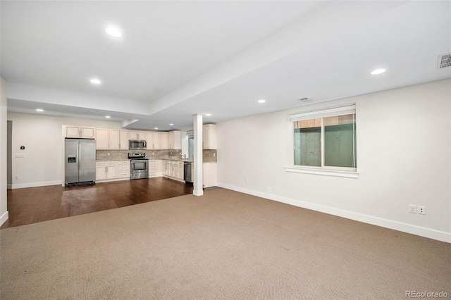 5372 W 68th Ave, Arvada, CO 80003 - unfurnished living room featuring dark carpet, baseboards, visible vents, and recessed lighting