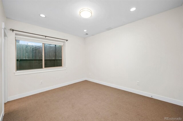 5372 W 68th Ave, Arvada, CO 80003 - carpeted spare room with baseboards and recessed lighting