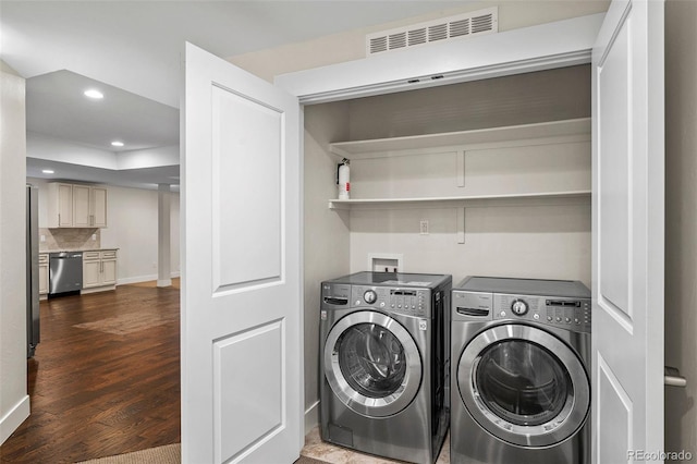 5372 W 68th Ave, Arvada, CO 80003 - washroom with washer and clothes dryer, wood finished floors, laundry area, visible vents, and recessed lighting