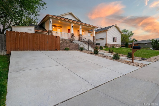 5372 W 68th Ave, Arvada, CO 80003 - view of front of home featuring a porch and fence