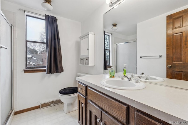 full bathroom with plenty of natural light, a shower stall, visible vents, and tile patterned floors