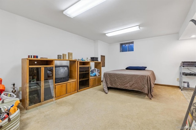 carpeted bedroom with baseboards