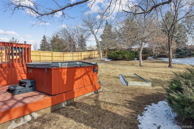 view of yard featuring a fenced backyard and a deck