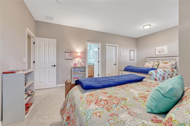 16256 Ridge Run Dr, Colorado Springs, CO 80908 - carpeted bedroom featuring ensuite bathroom and baseboards