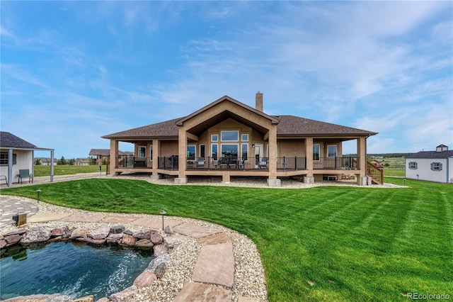16256 Ridge Run Dr, Colorado Springs, CO 80908 - rear view of property with a yard, a chimney, and a shingled roof