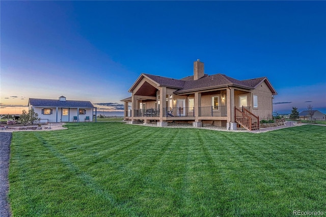 16256 Ridge Run Dr, Colorado Springs, CO 80908 - back of property with a yard and a chimney