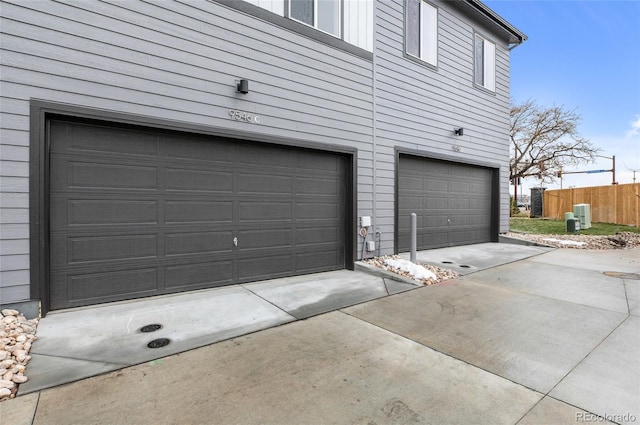 garage with fence