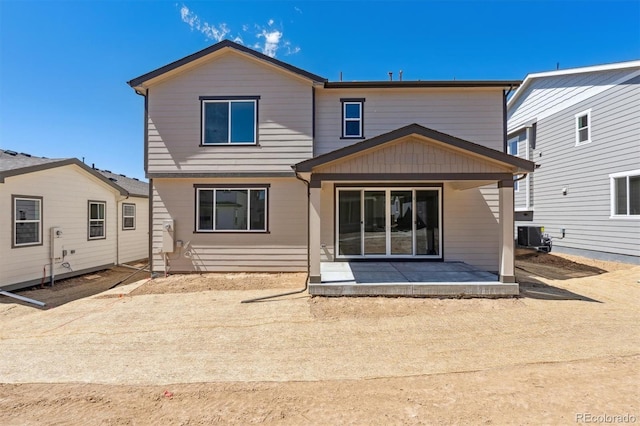 9082 Telluride Ct, Commerce City, CO 80022 - back of property with a patio and central AC