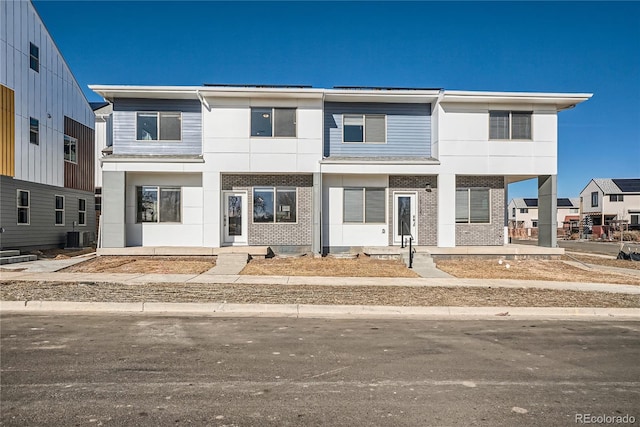 15336 W 68th Loop, Arvada, CO 80007 - view of front of property with brick siding