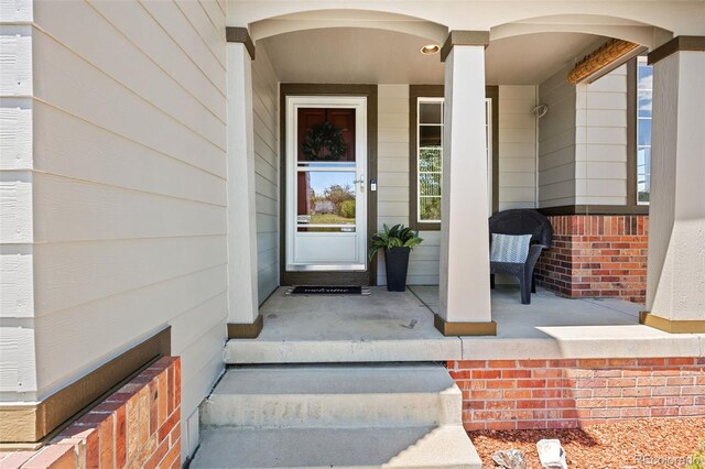 4467 Trailside Ln, Castle Rock, CO 80109 - view of exterior entry featuring covered porch