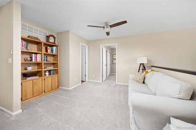 4467 Trailside Ln, Castle Rock, CO 80109 - living area with light carpet, baseboards, and a ceiling fan