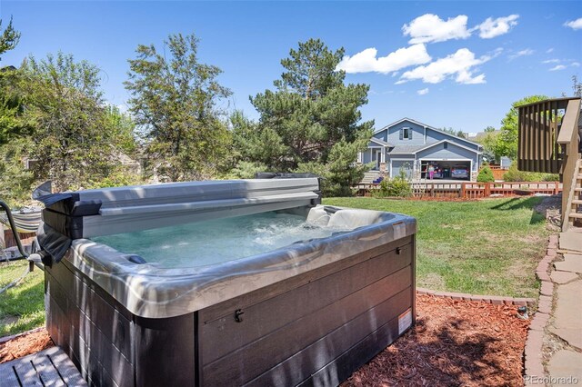 4467 Trailside Ln, Castle Rock, CO 80109 - view of green lawn featuring a hot tub