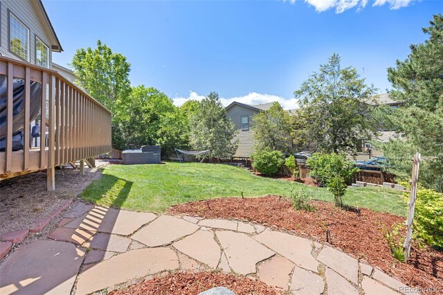 4467 Trailside Ln, Castle Rock, CO 80109 - view of grassy yard featuring a deck