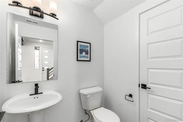 bathroom with a sink and toilet
