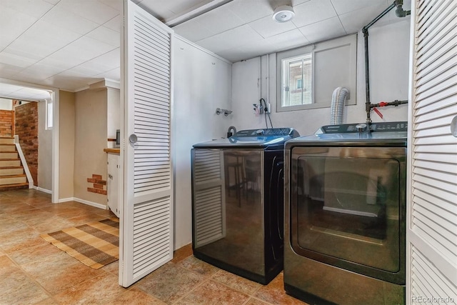 laundry area featuring washing machine and dryer