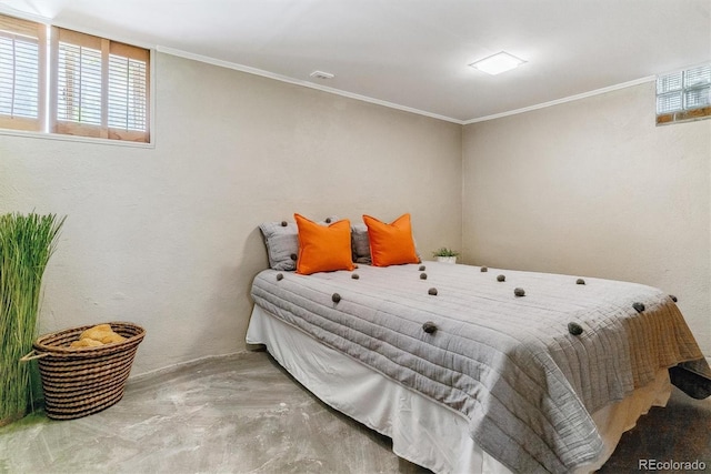 bedroom featuring ornamental molding and concrete flooring